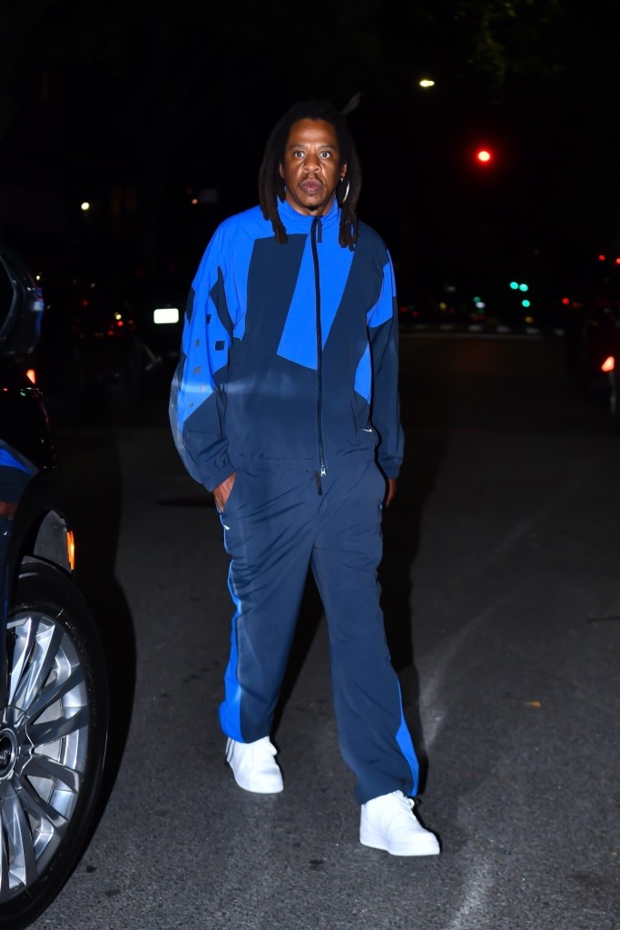 Jay-Z wears a blue tracksuit in Brooklyn