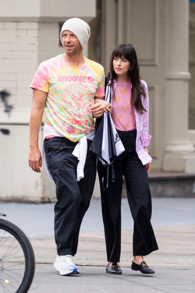 Chris Martin and Dakota Johnson take a walk in New York City in June 2022.