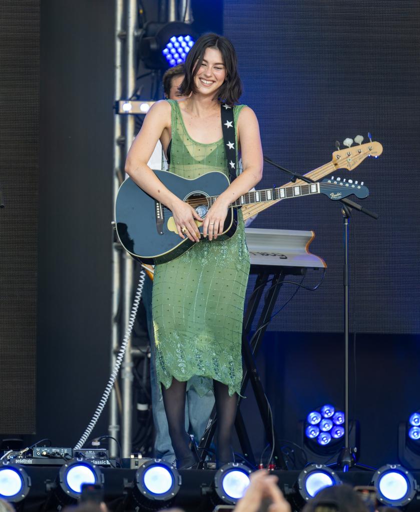 Gracie Abrams in green dress