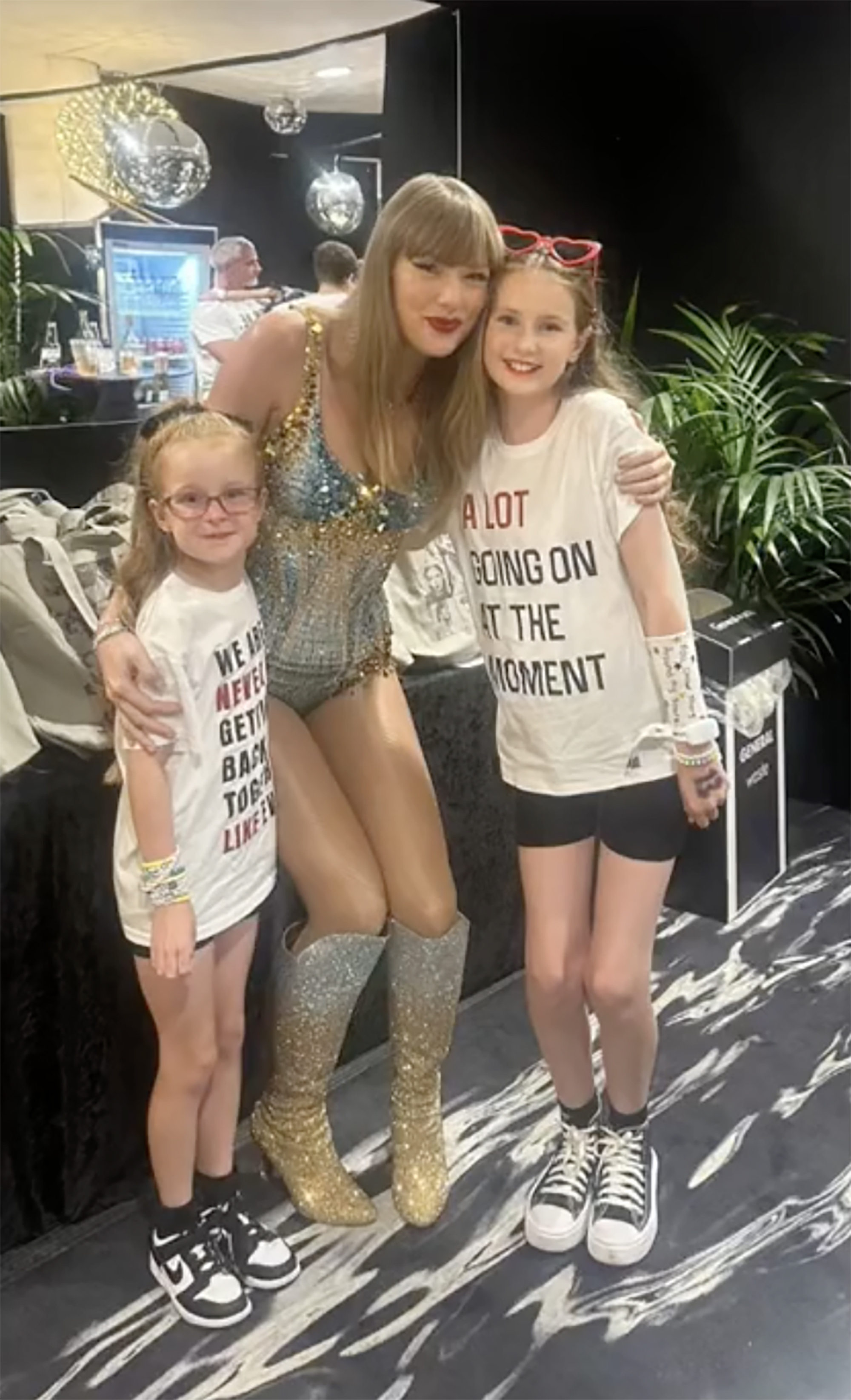 Taylor Swift with two young fans.