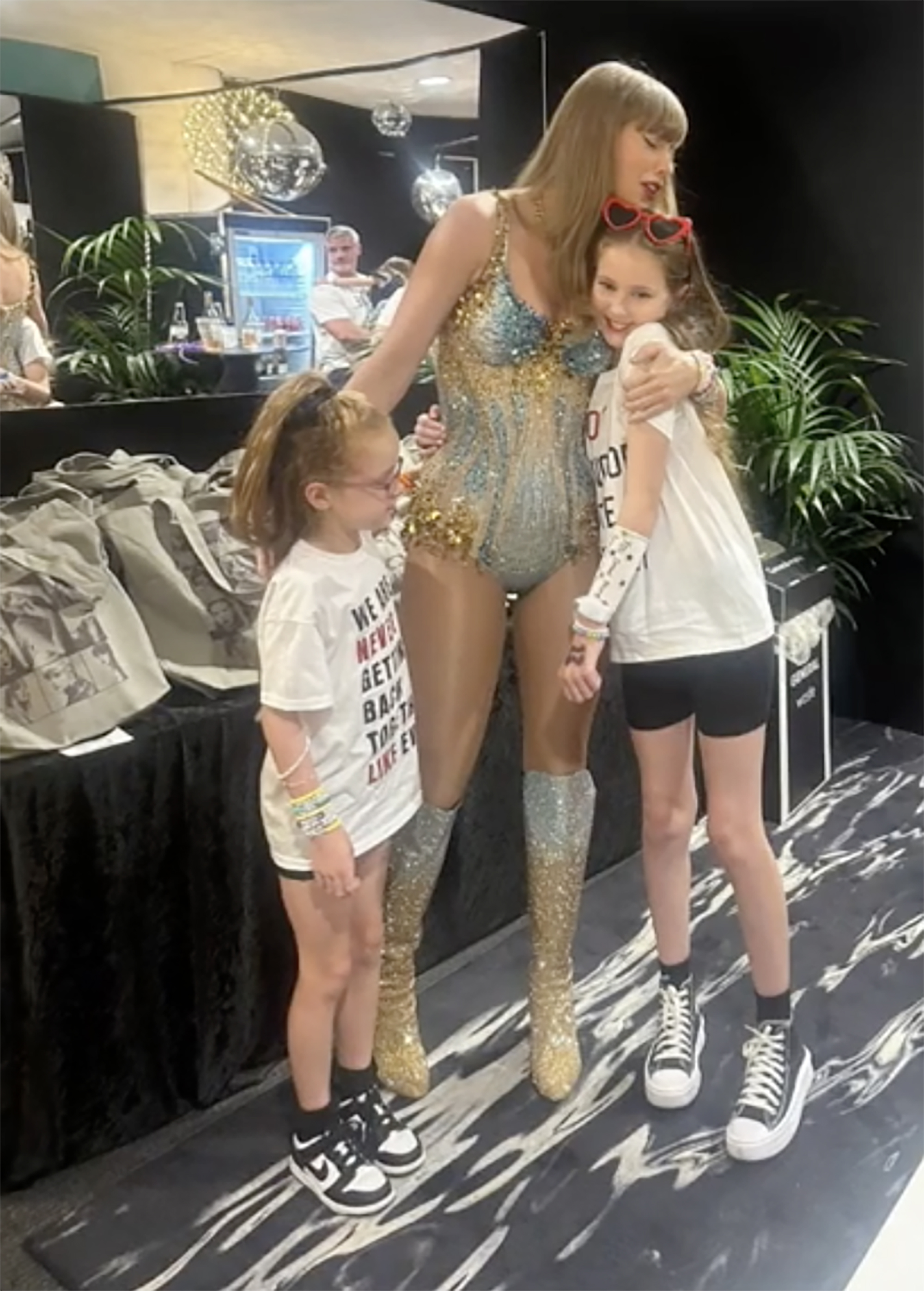 Taylor Swift with two young fans.