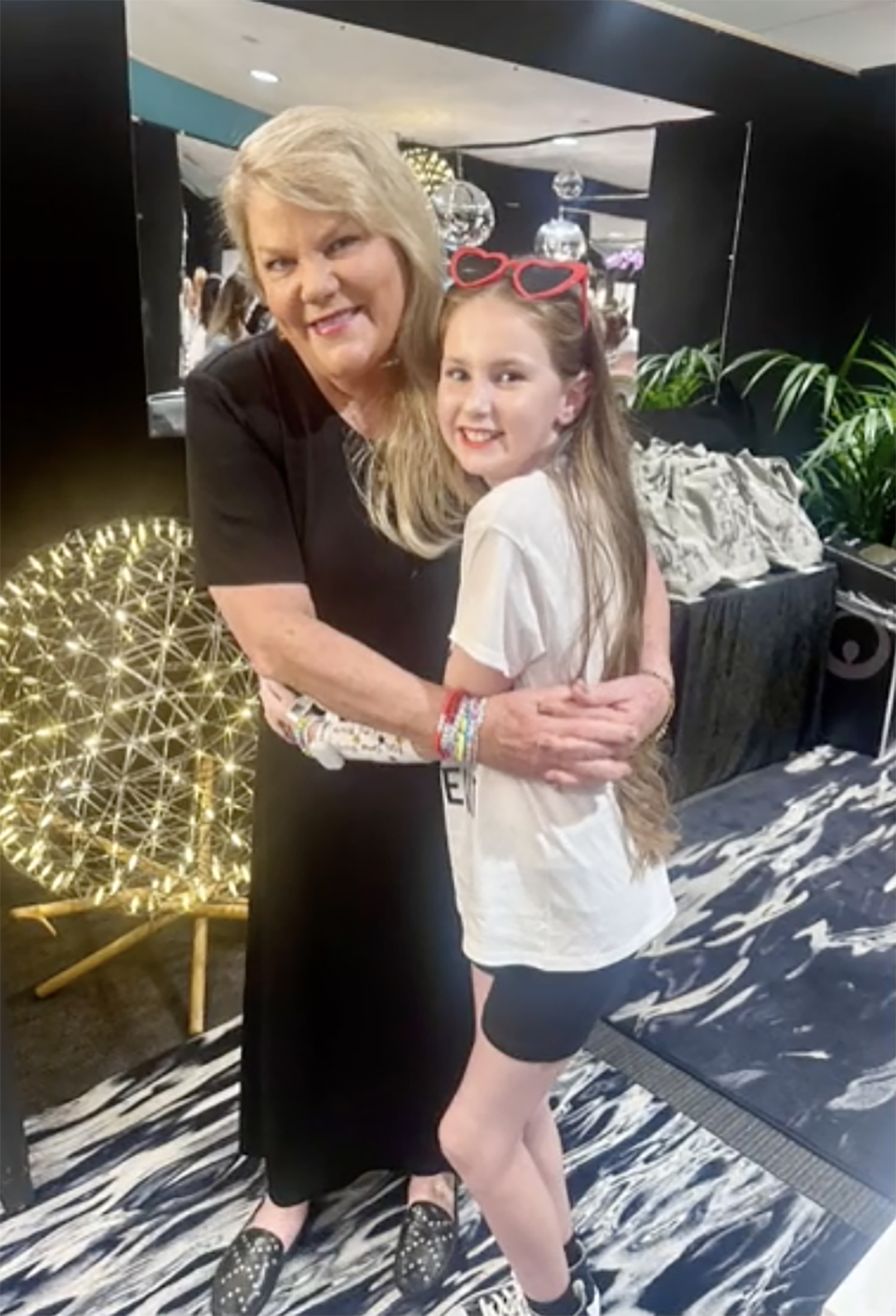 Andrea Swift and a young fan