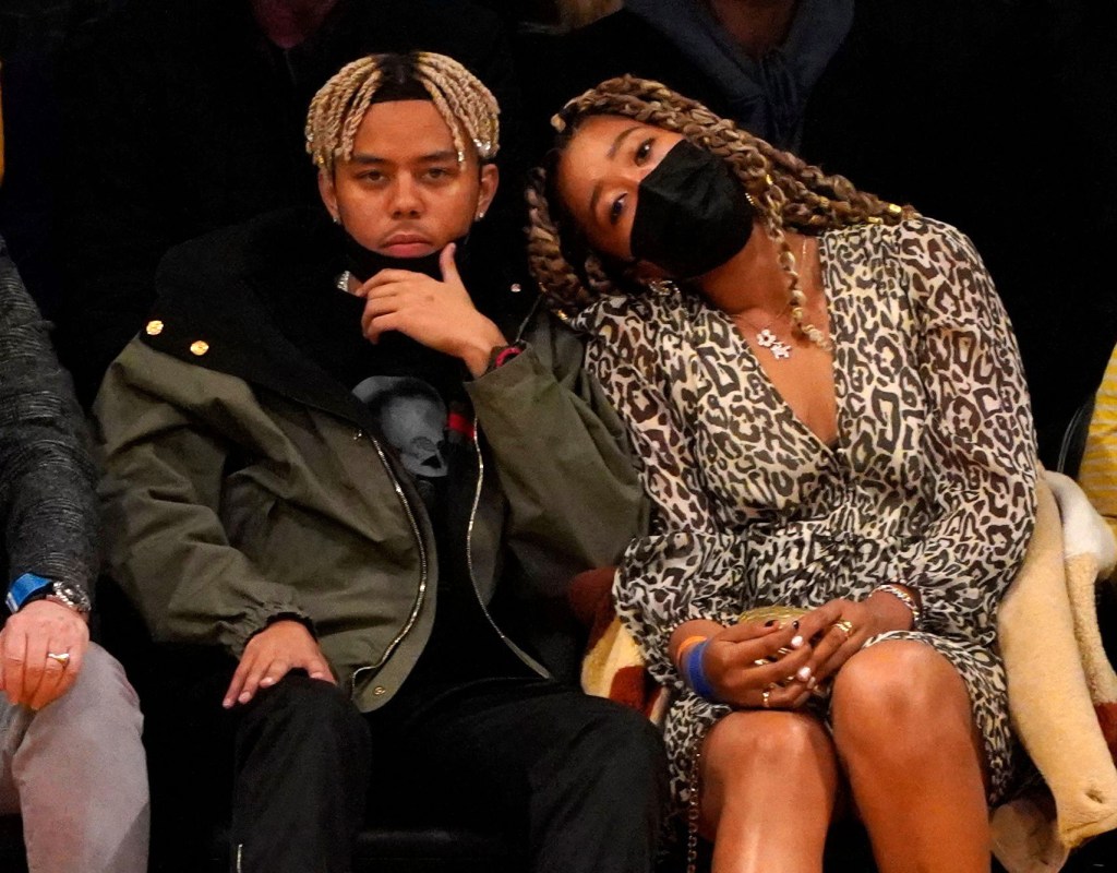 Naomi Osaka and Cordae at Lakers game in December 2021