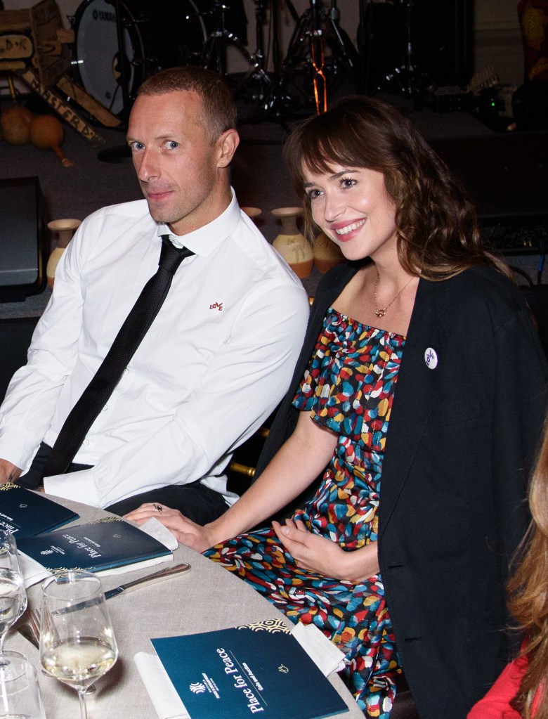 Chris Martin and Dakota Johnson Attend "Place for Peace" event in New York City in September 2019.